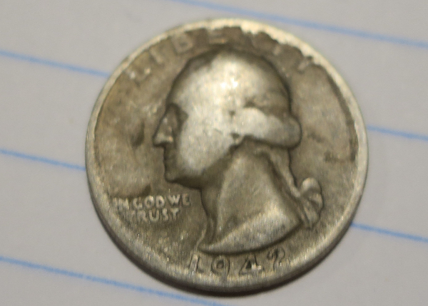 1942-Quarter-Capped-Die?-Damage?-Or-Something-Else.